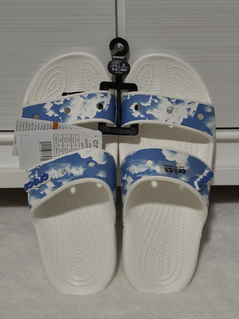 CROCS Women's White Slides with Cloud-Print Blue Straps